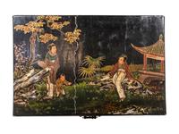 A Chinese Export Parcel Gilt and Lacquered Chest on Stand