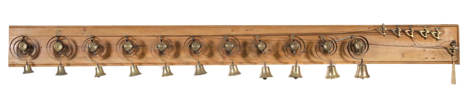 A Set of English Brass Service Bells Width of rack 111 inches. — 19TH CENTURY