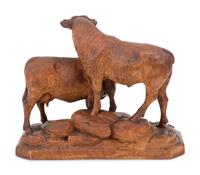 A Swiss Black Forest Carved Bull and Cow Group
