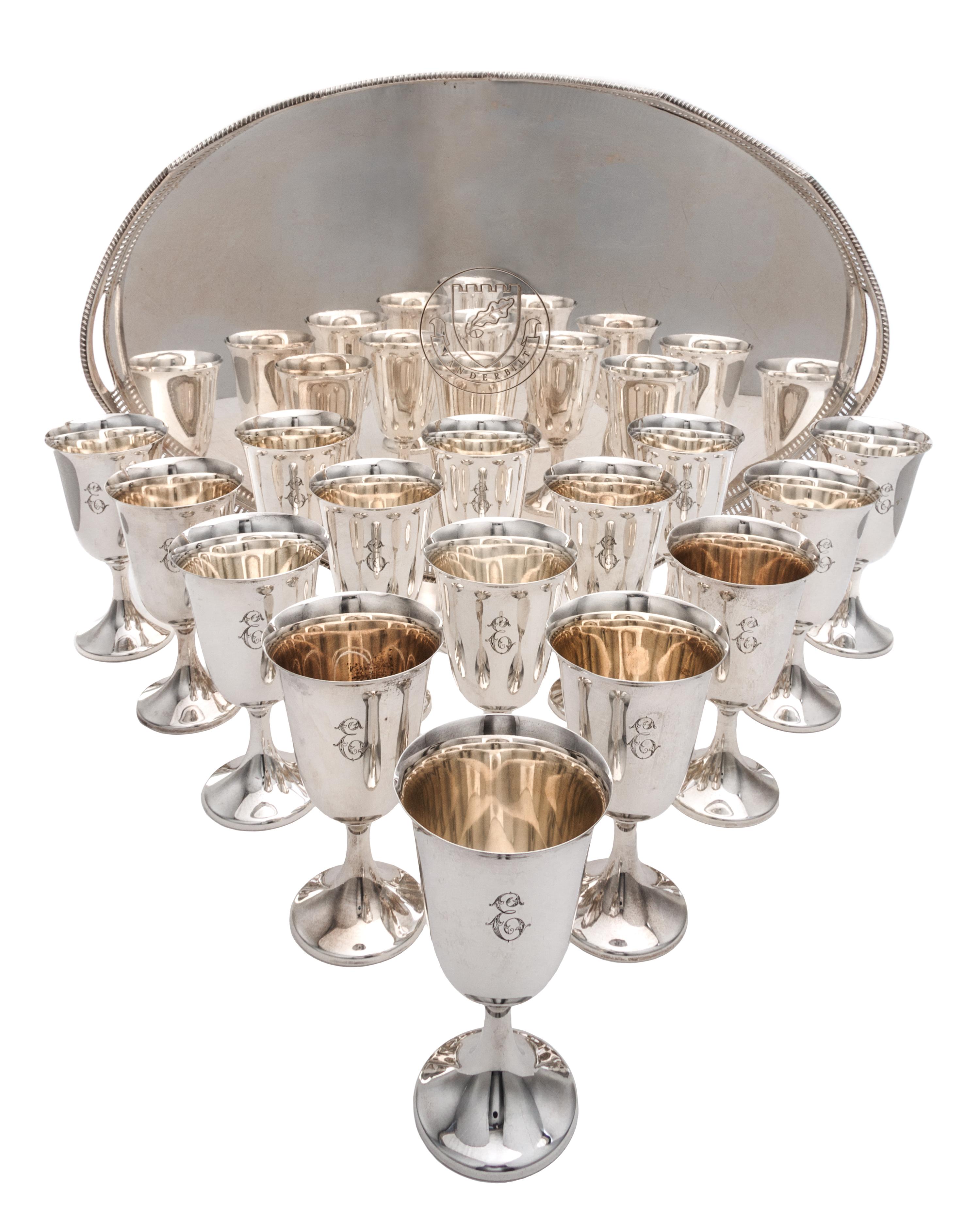 A Collection of Sixteen Sterling Water Goblets, Revere Silversmiths, Brooklyn, NY, each having an engraved script monogram E and raised
