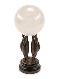 A Rock Crystal Spherical Ornament on a Bird Motif Base