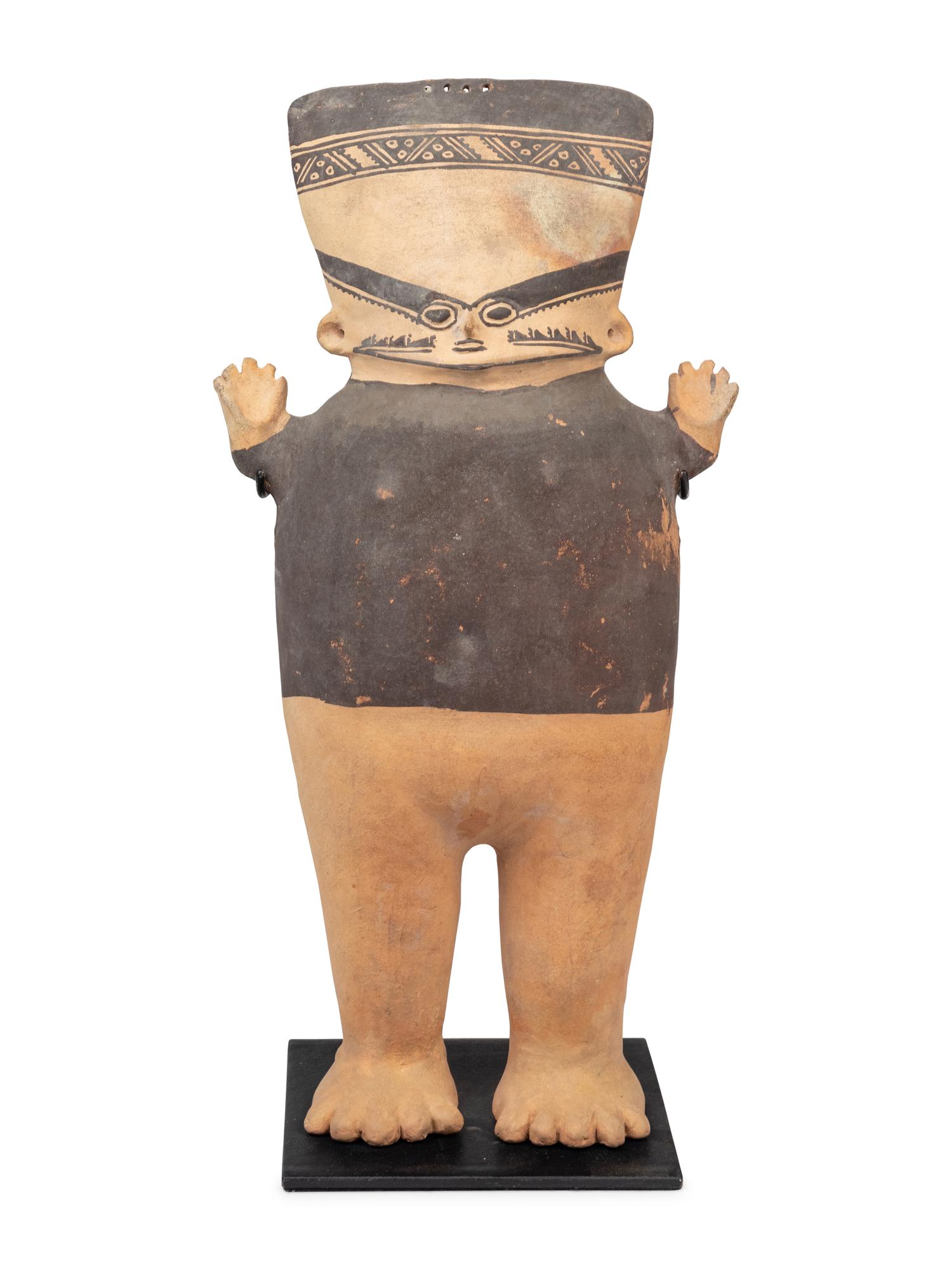 A Chancay Bichrome Figure