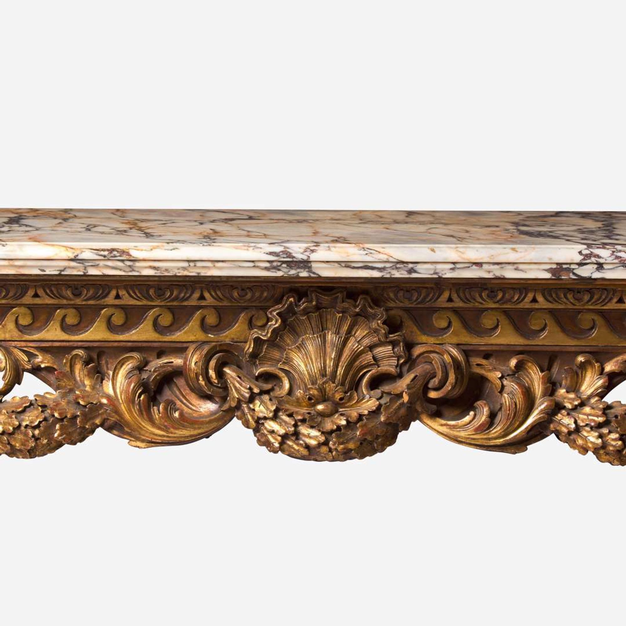 A George I style giltwood side table with breccia marble top In the style of William Kent (English, 1685-1748), 19th century