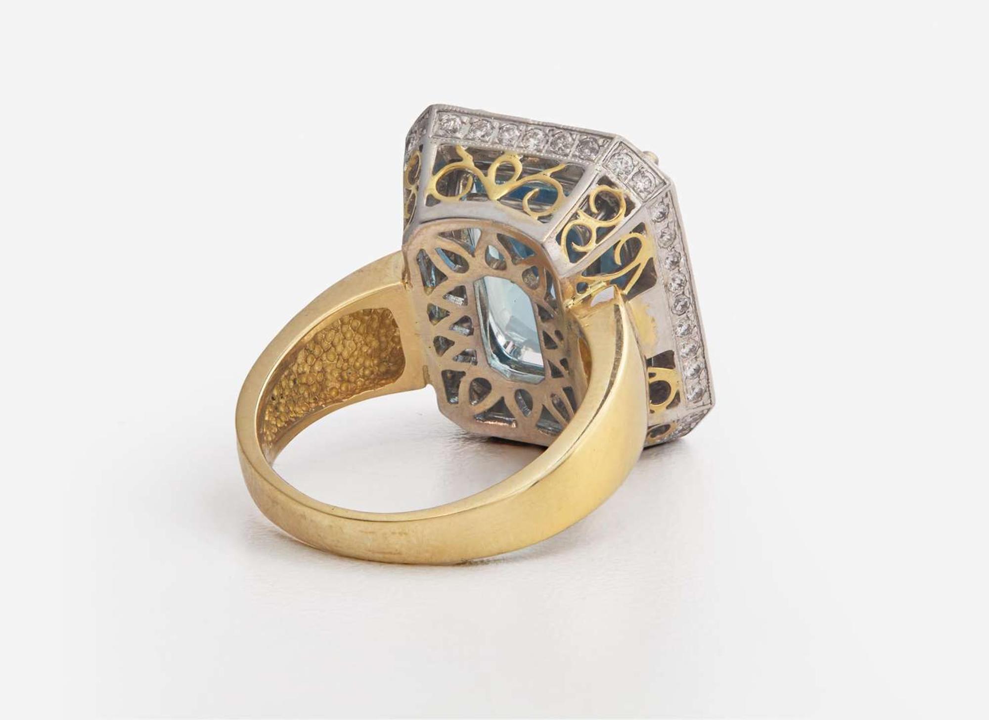 An 18K Gold, Aquamarine, and Diamond Ring