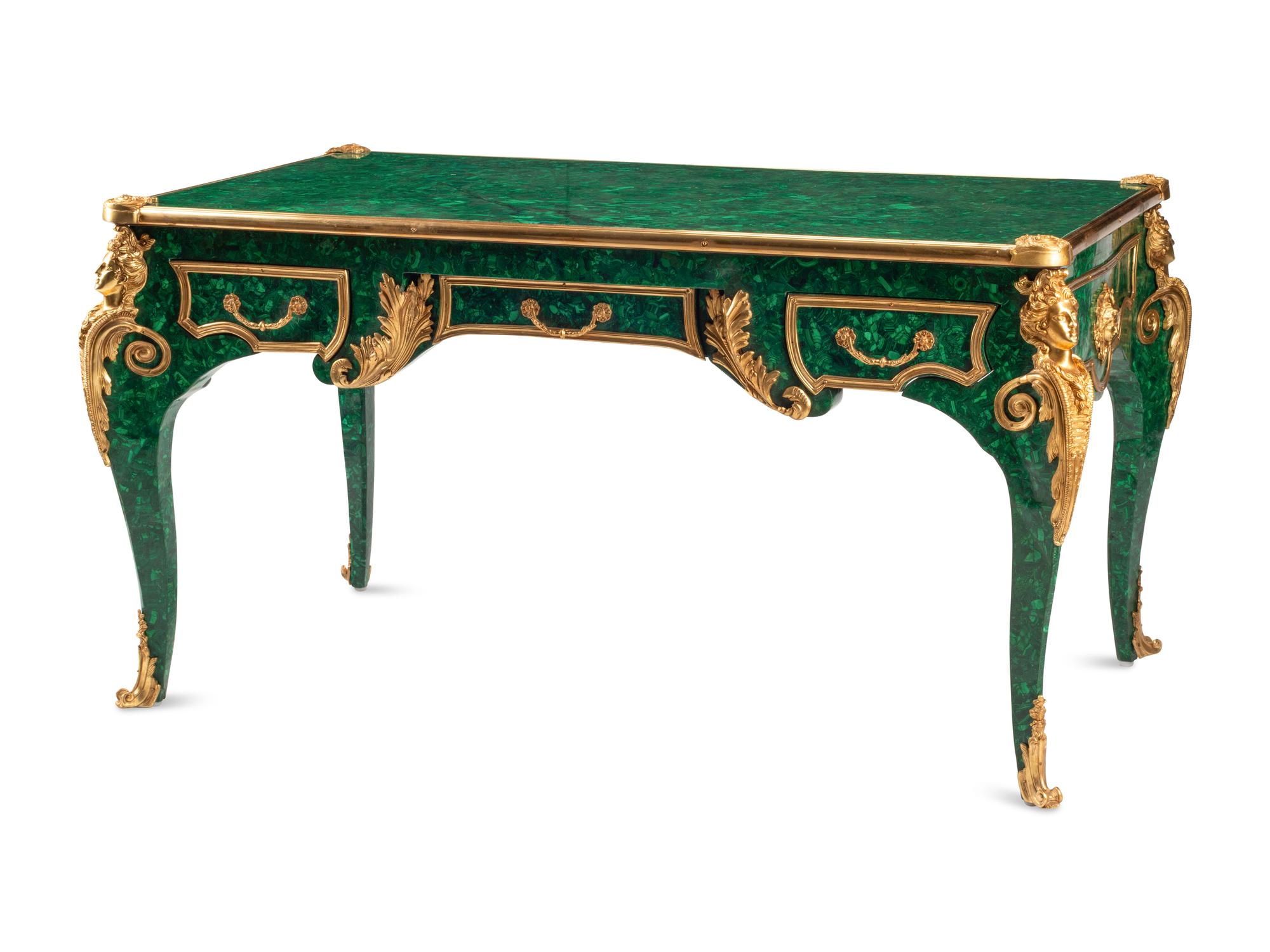 A Louis XV Style Gilt Bronze Mounted Malachite-Veneered Bureau Plat