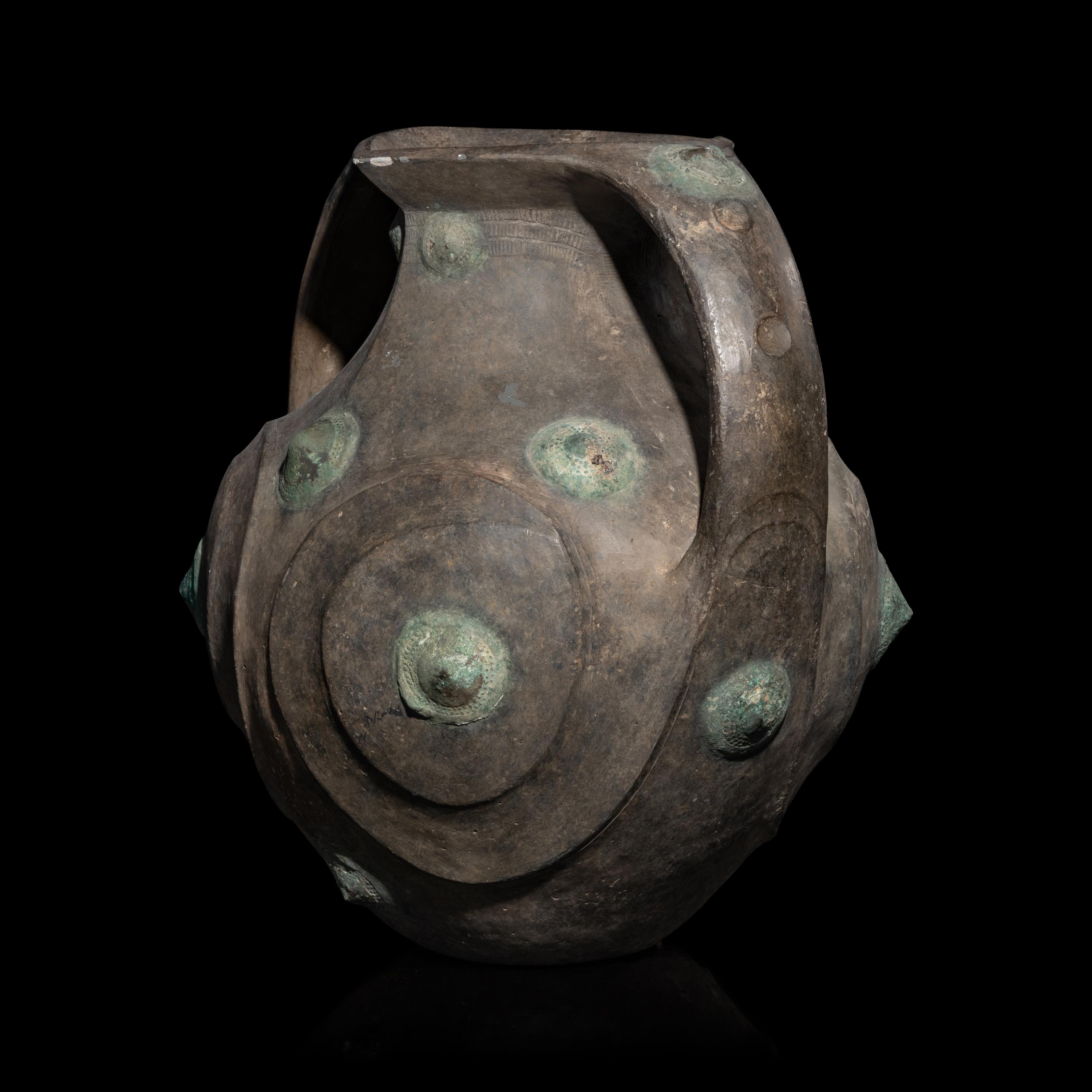 A Chinese Grey Pottery Amphora with Metal Boss Appliques, Western Han Dynasty — 西漢 黑陶嵌铜泡钉双耳壶