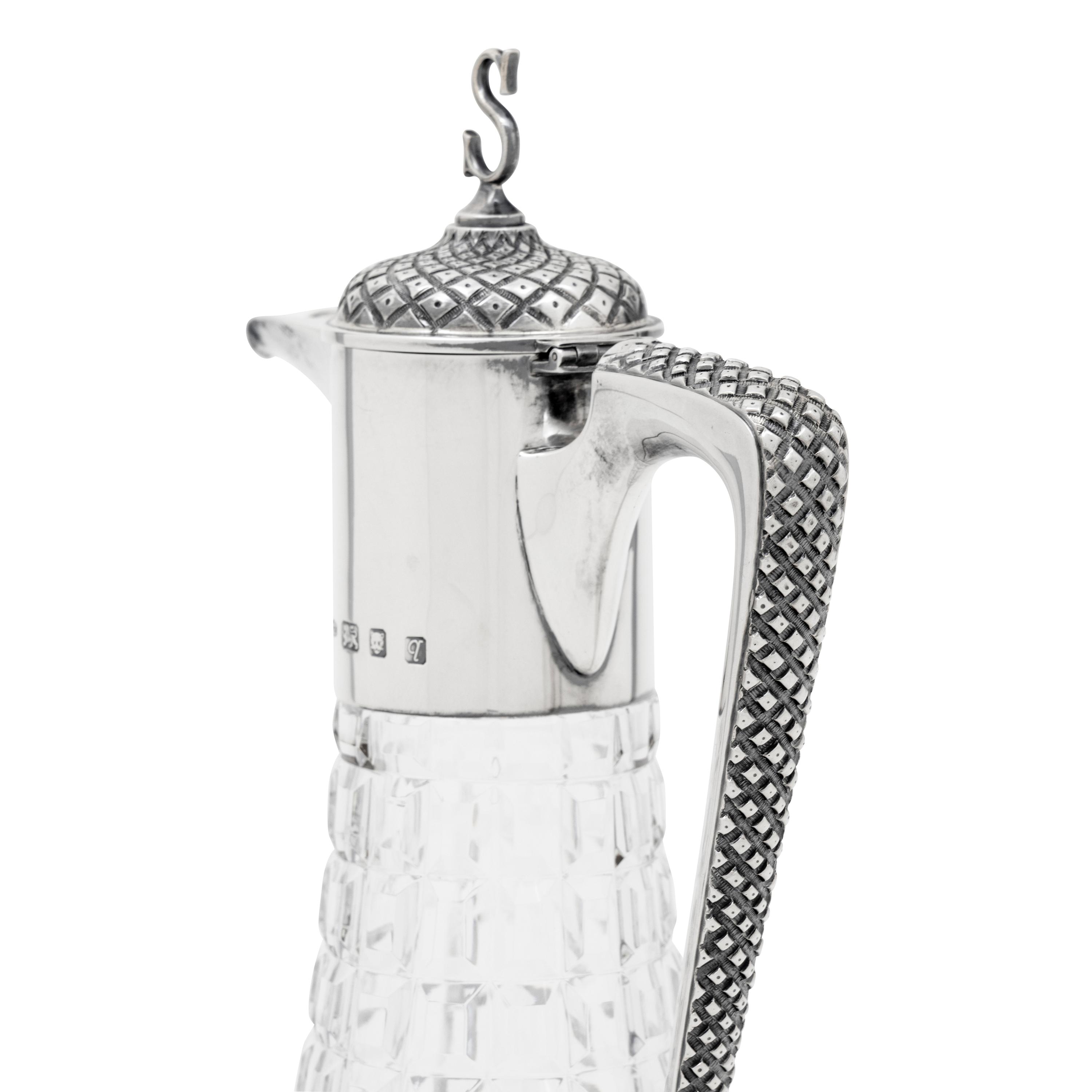An English Silver Mounted Cut Glass Claret Jug