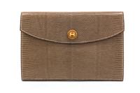 An Hermes Taupe Lizardskin Rio Clutch, 9 1/2 x 6 1/2 x 1 inches.