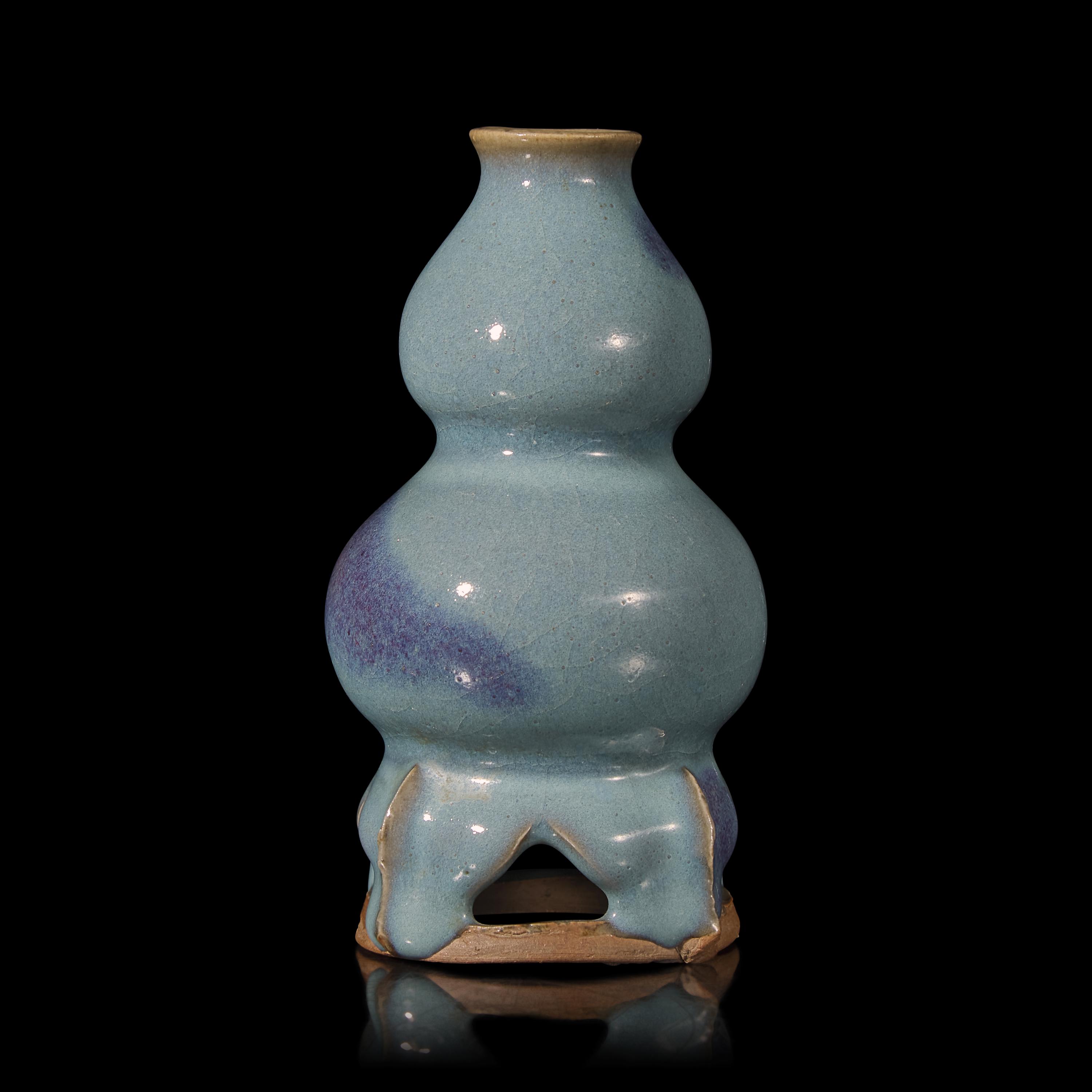 A Chinese Jun Style Purple Splashed 'Double Gourd' Vase with Integral Stand — 紫斑藍鈞葫蘆連座瓶