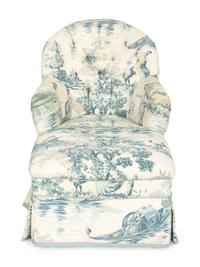 A Blue, White and Cream Upholstered Club Chair and Ottoman