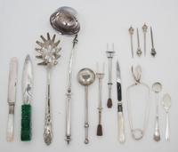 A Large Group of Silver-Plate Articles, , comprising: 1 ladle 1 pasta spoon 1 ice pick 1 tea strainer 5 teaspoons 2 letter openers 2 pu