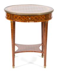 A Louis XVI Style Parquetry Inlaid Gilt Bronze Mounted Gueridon Height 29 1/2 x diameter 25 1/2 inches. — 19TH CENTURY