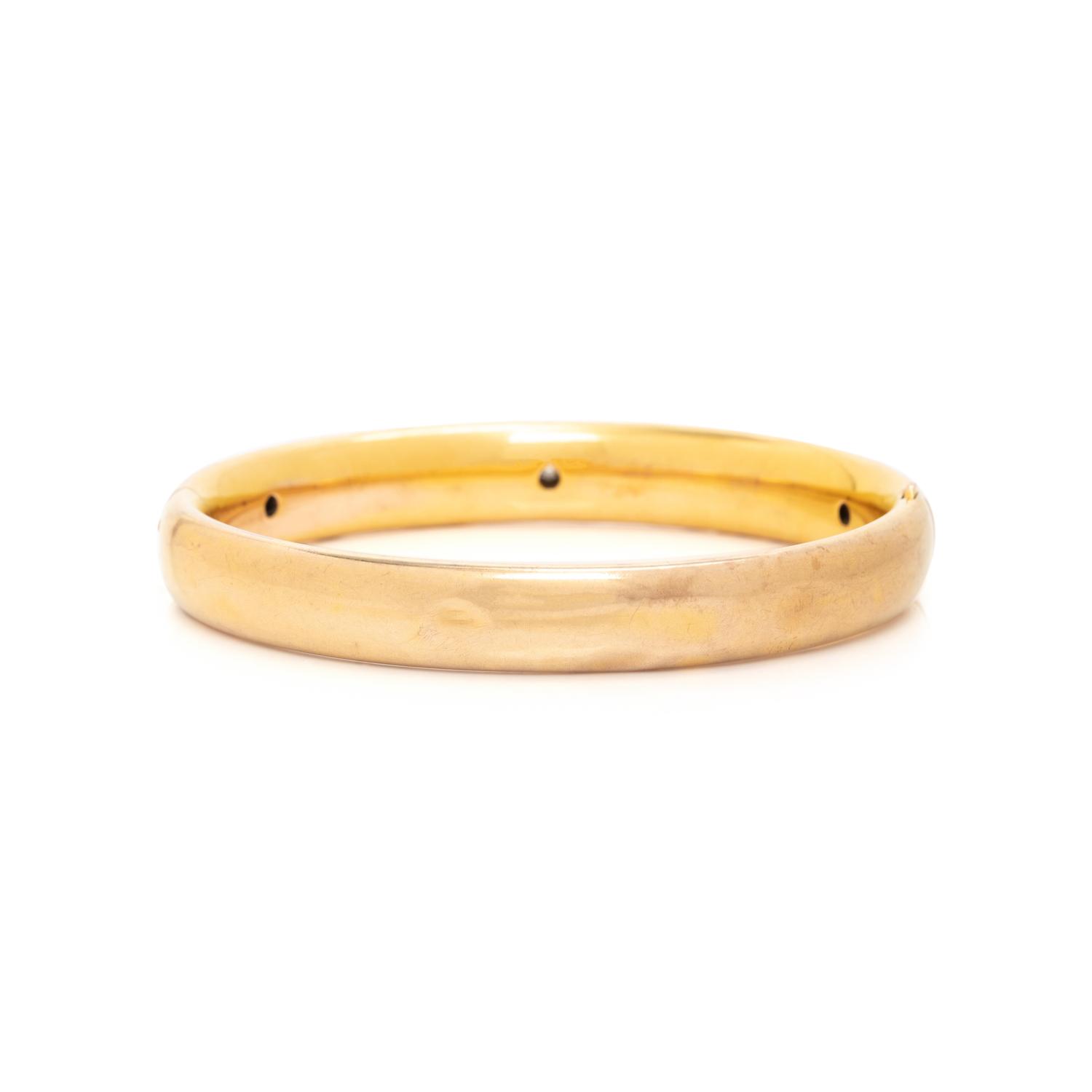 YELLOW GOLD AND DIAMOND FLORAL BANGLE BRACELET