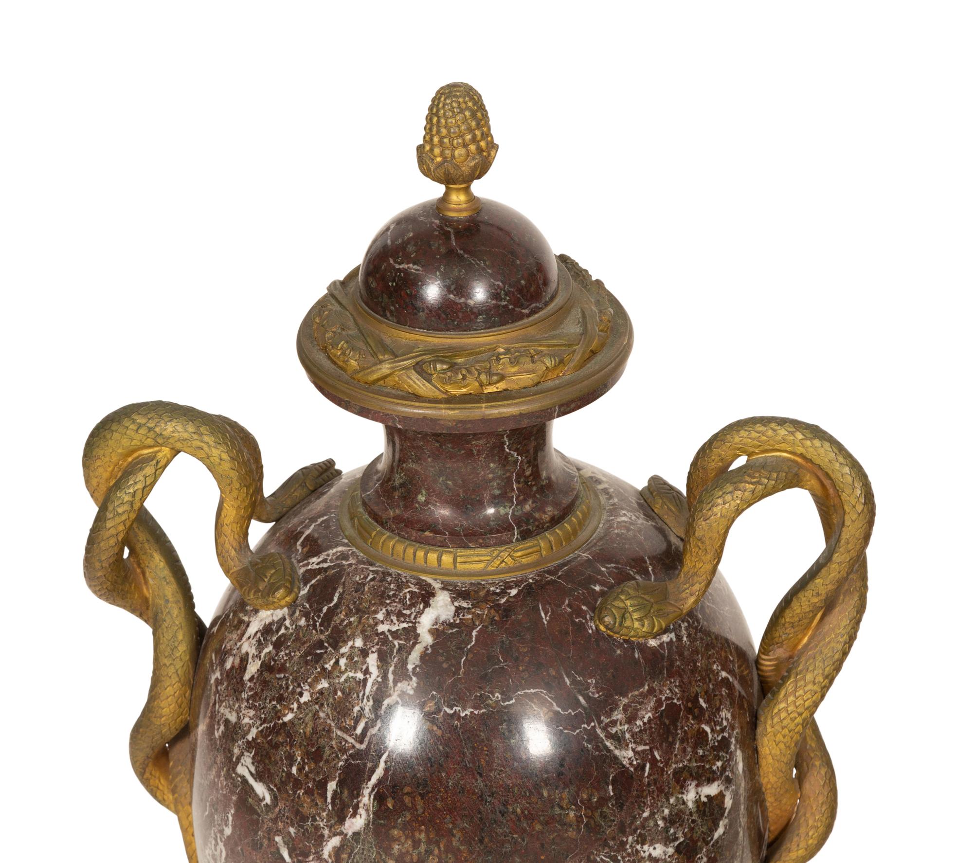 A Pair of Italian Gilt Bronze Mounted Rosso Levanto Marble Urns with Snake Handles