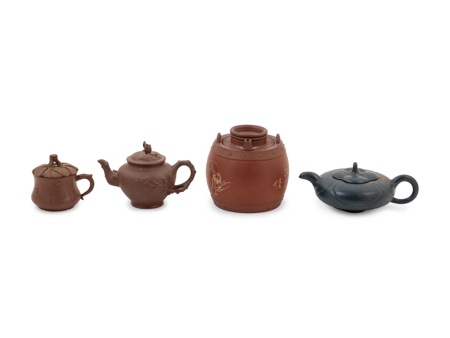Four Chinese Yixing Pottery Teapots