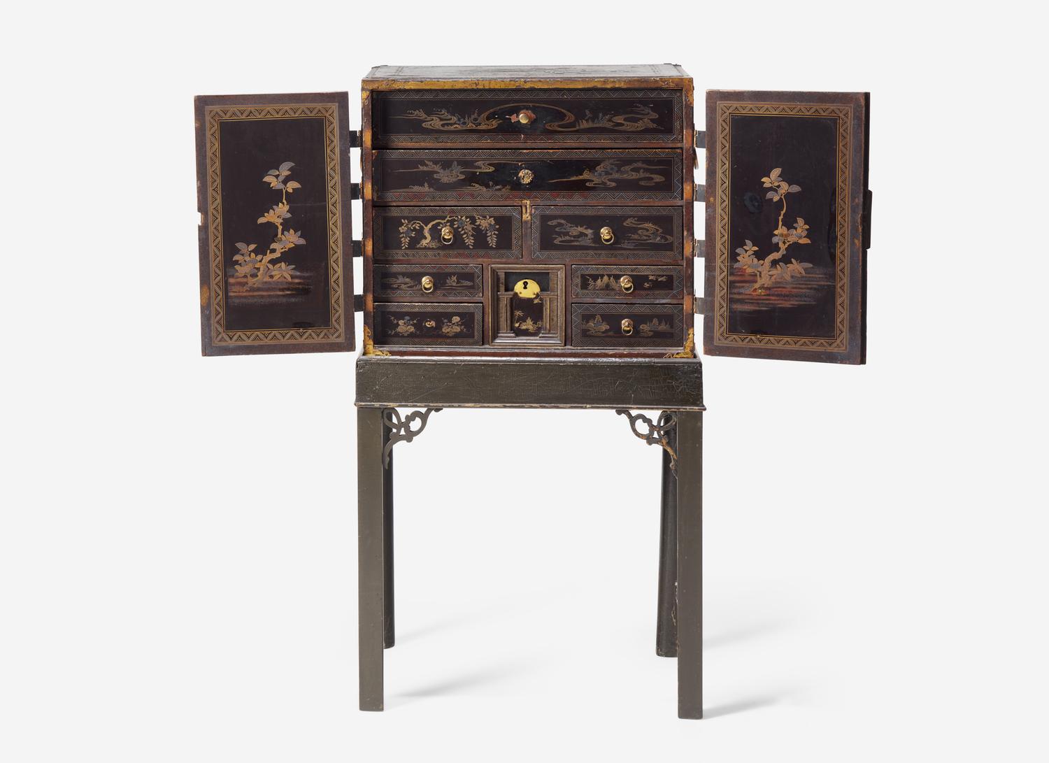 A George III Parcel Gilt Japanned Cabinet on Stand