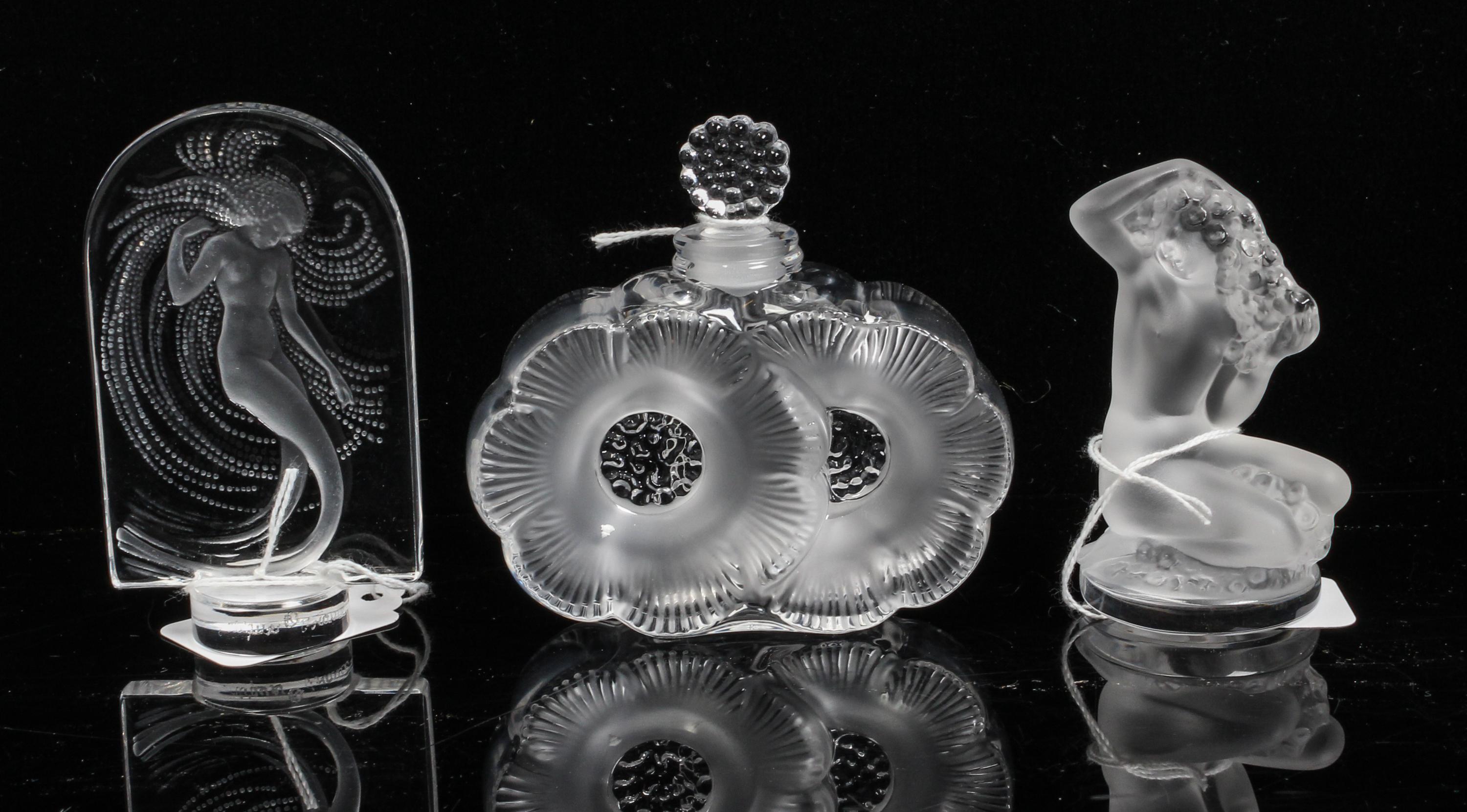 Three Lalique Molded and Frosted Glass Table Articles Height of tallest 3 3/4 inches. — 20TH CENTURY