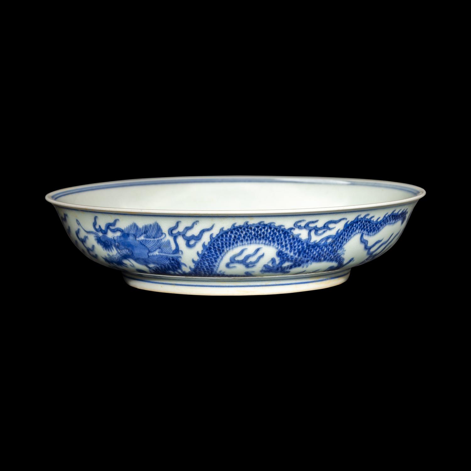 A Chinese Blue and White Porcelain 'Dragon' Plate, Jiaqing Mark and Possibly of the Period 或爲清嘉慶 青花龍戲珠賞盤