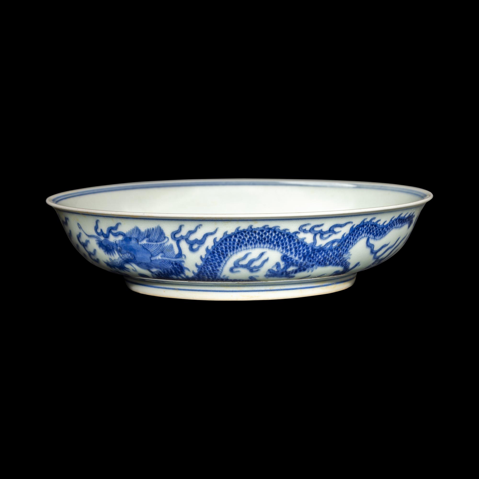 A Chinese Blue and White Porcelain 'Dragon' Plate, Jiaqing Mark and Possibly of the Period 或爲清嘉慶 青花龍戲珠賞盤