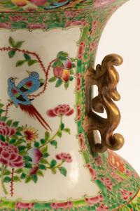 A Pair of Rose Medallion Porcelain Vases on Carved Giltwood Bases