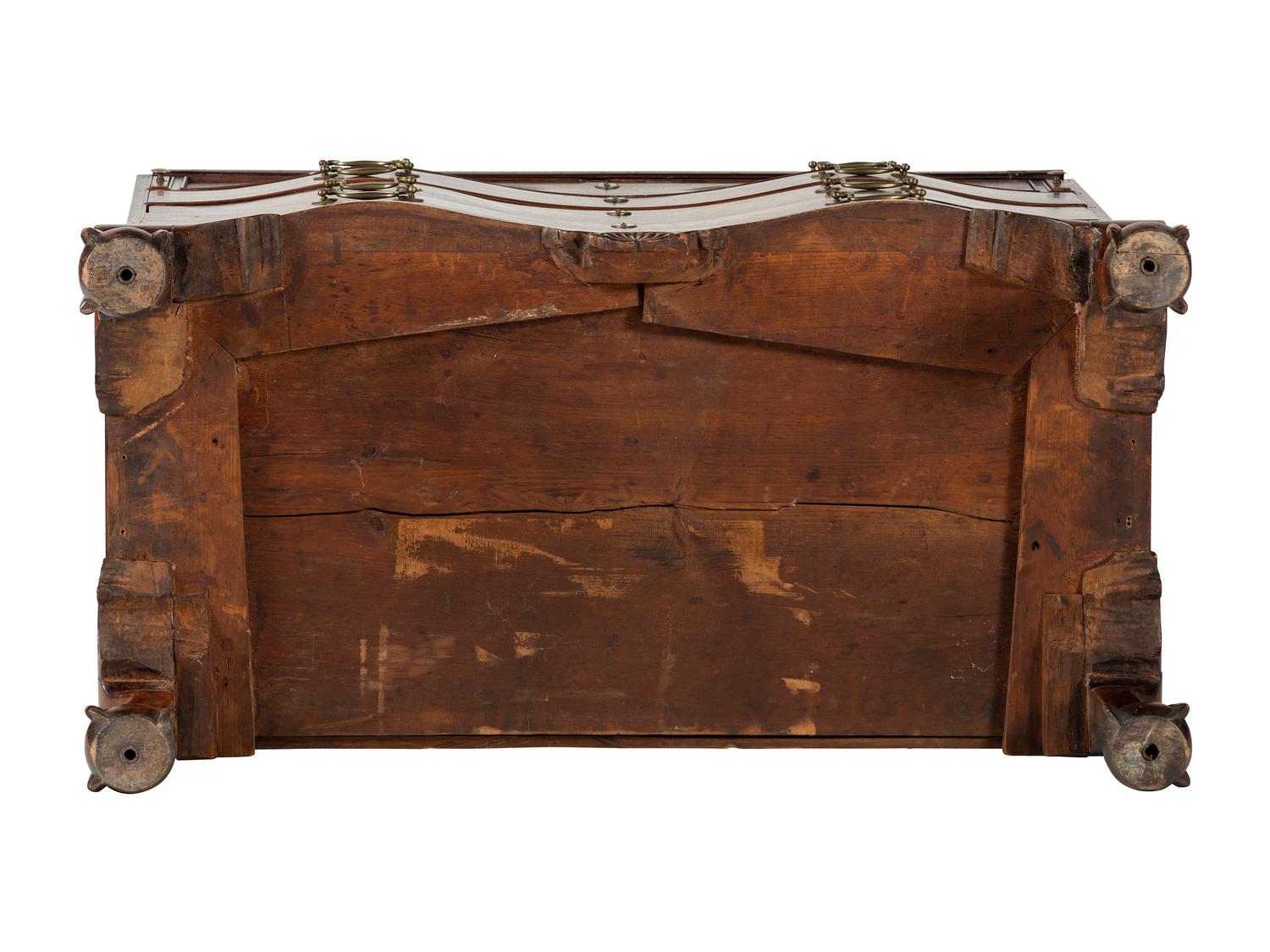 A Chippendale Mahogany and Cherrywood Serpentine Claw-and-Ball Foot Desk-and-Bookcase