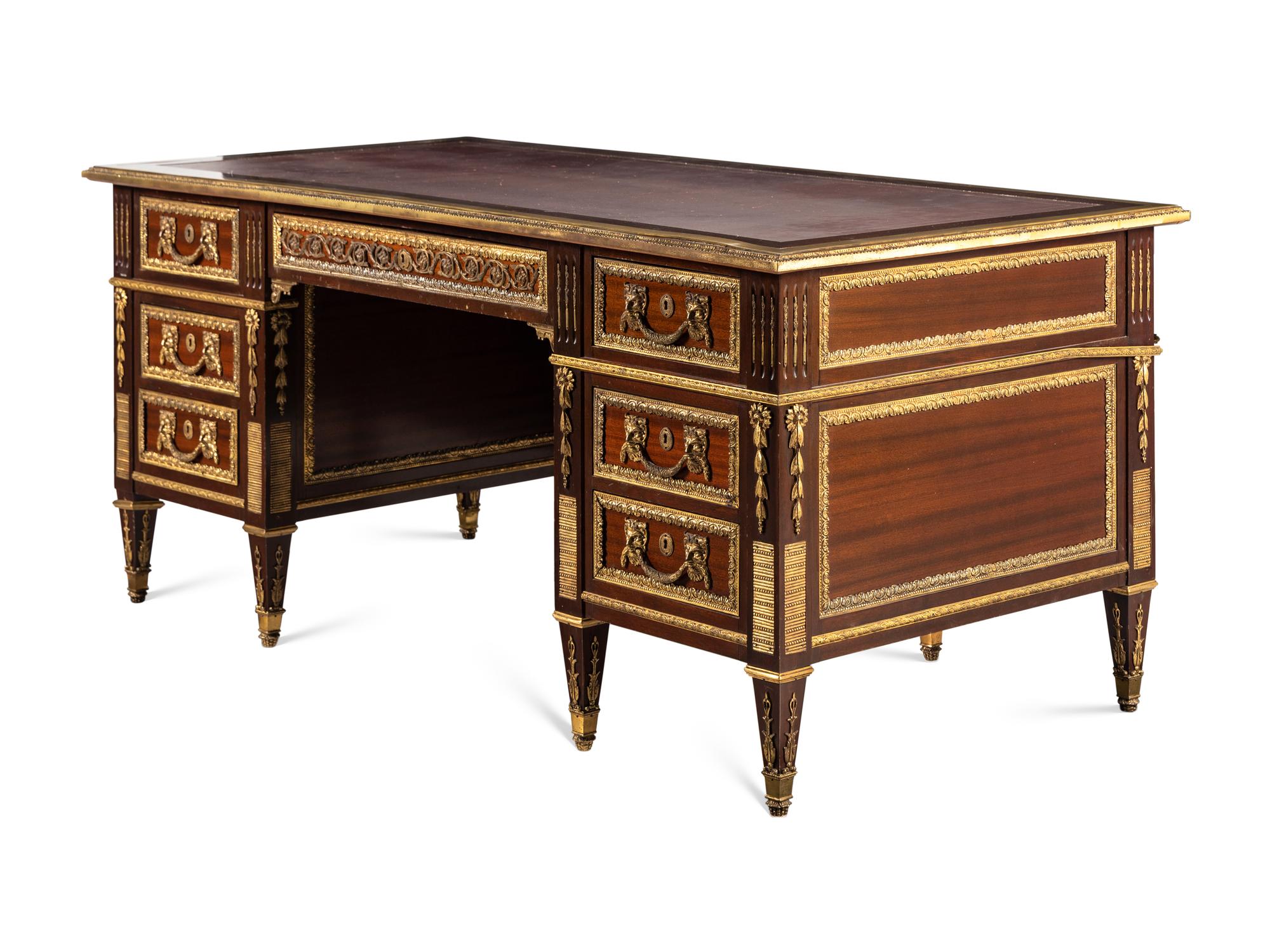 A Louis XVI Style Gilt Bronze Mounted Mahogany Bureau Plat