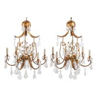 A Pair of Gilt Bronze, Tôle and Rock Crystal Six-Light Chandeliers