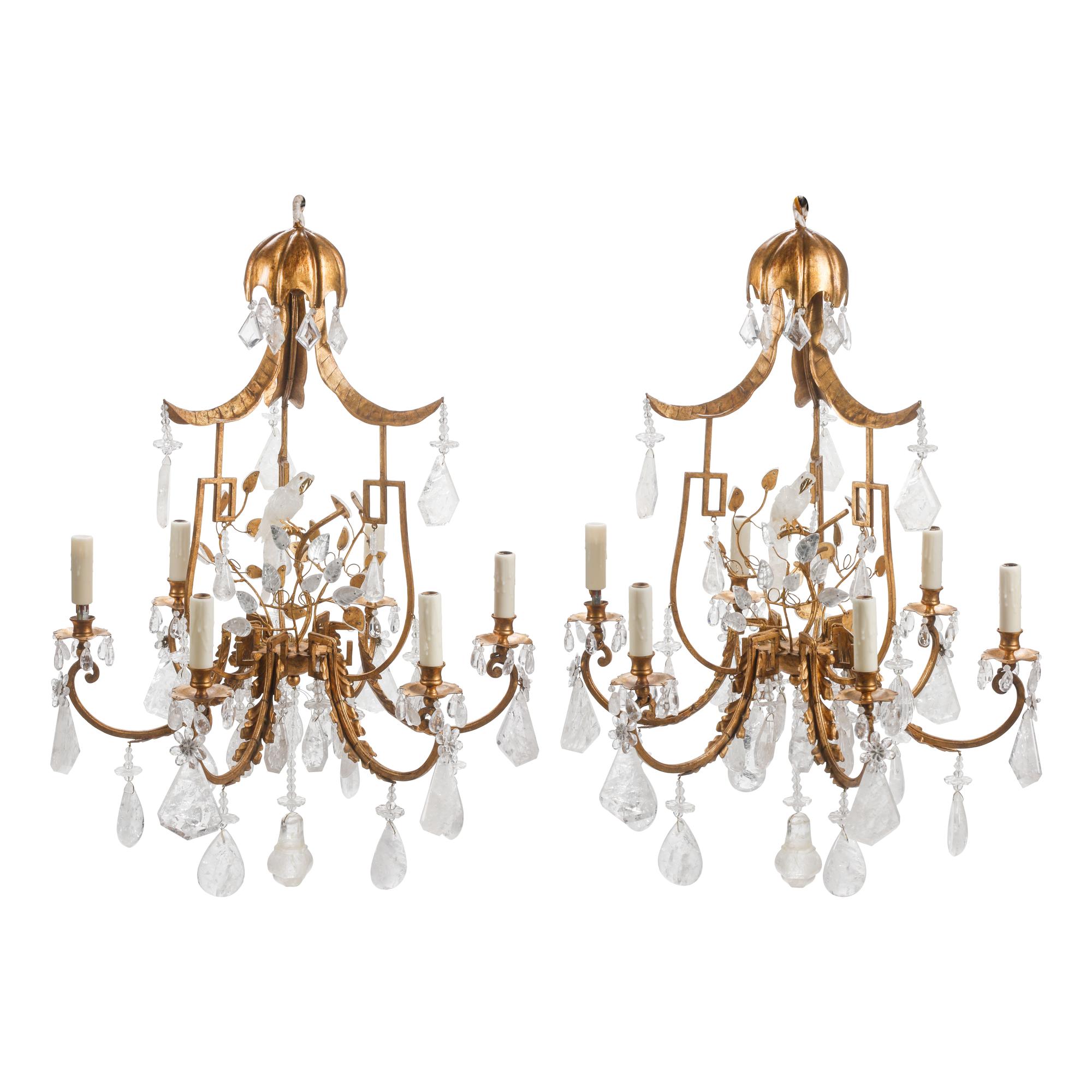 A Pair of Gilt Bronze, Tôle and Rock Crystal Six-Light Chandeliers