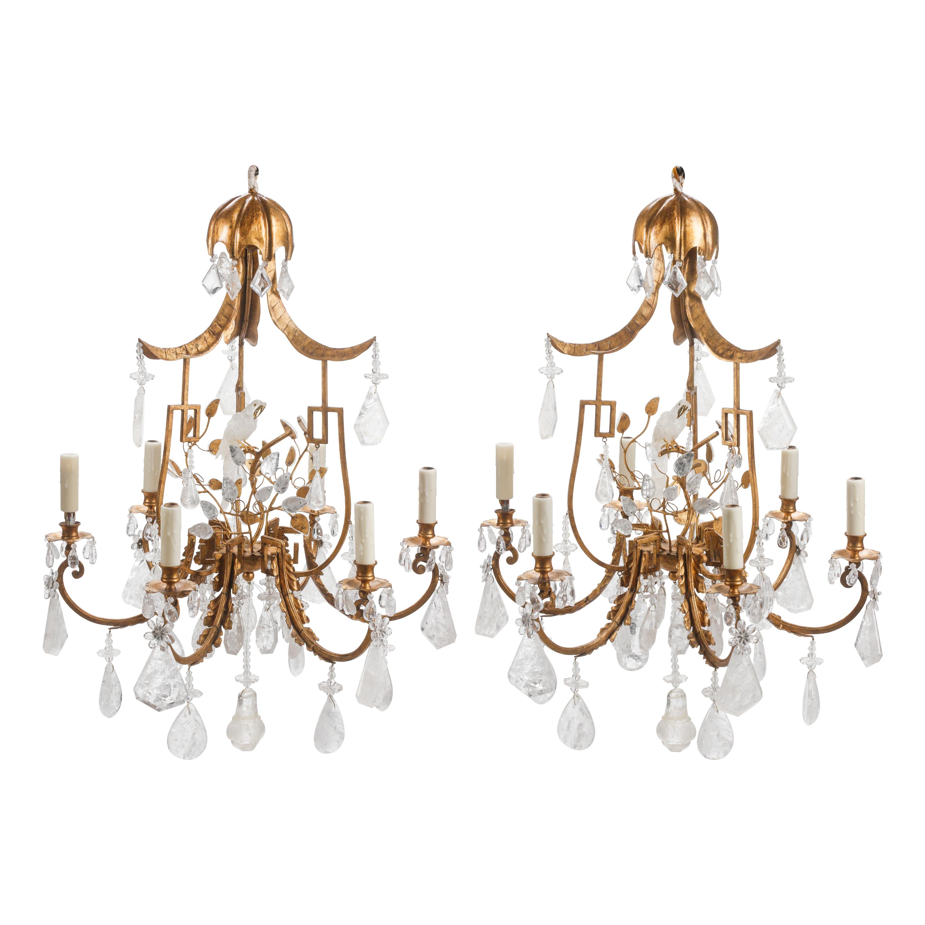 A Pair of Gilt Bronze, Tôle and Rock Crystal Six-Light Chandeliers