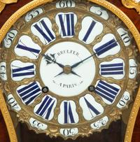 A Louis XV Gilt Bronze Mounted Kingwood Bracket Clock and Matching Wall Bracket
