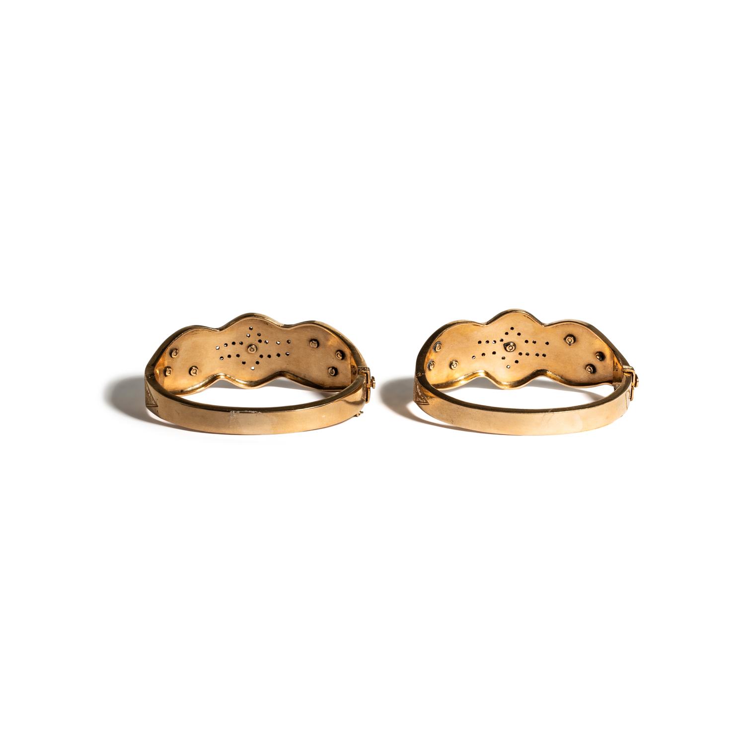PAIR OF DIAMOND, SYNTHETIC RUBY, AND ROSE GOLD BANGLE BRACELETS