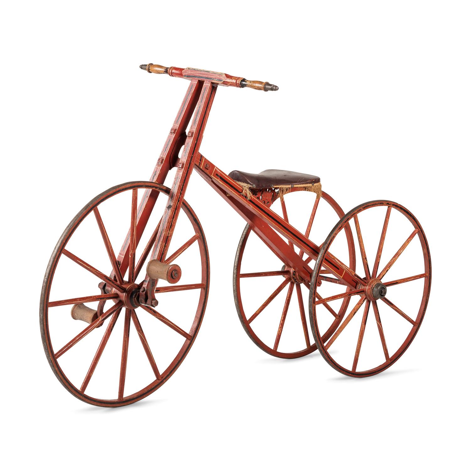A Carved and Painted Wood Boneshaker Child’s Bicycle