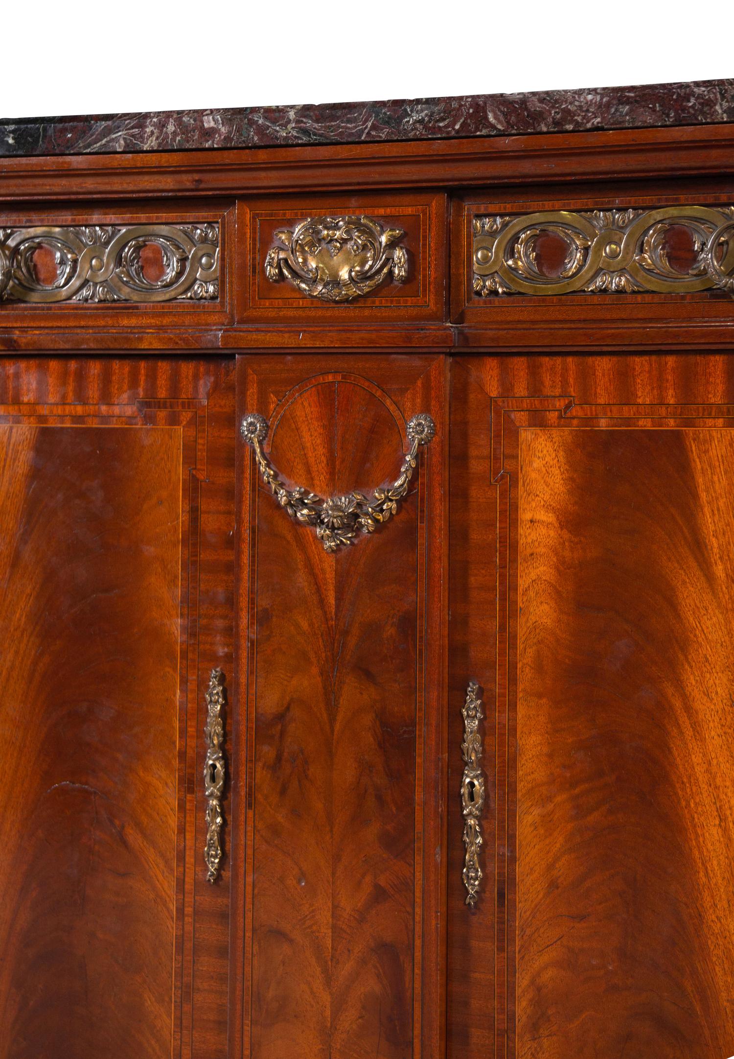 A Louis XVI Style Gilt Bronze Mounted Mahogany Marble-Top Console Cabinet