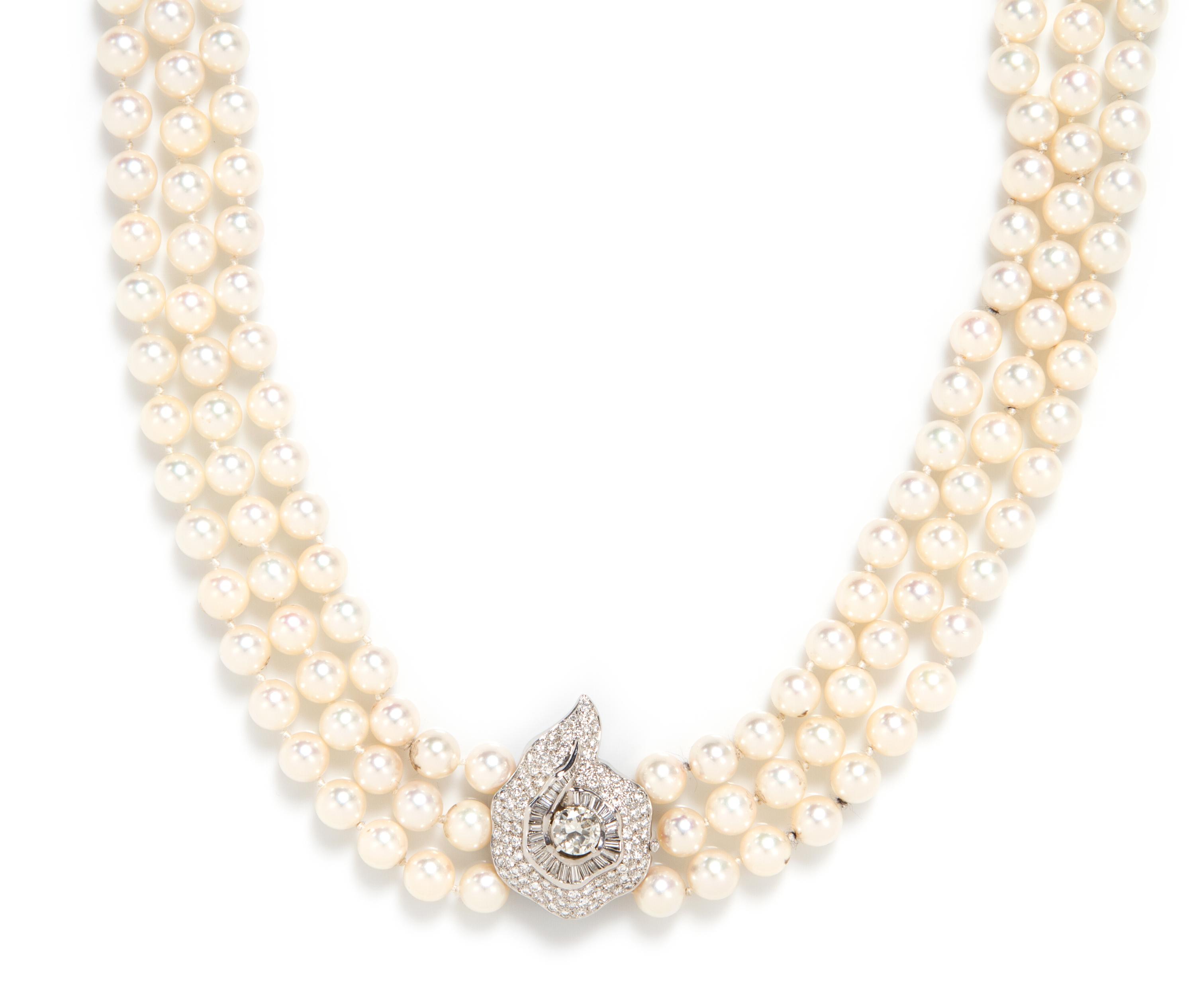 A Triple Strand Cultured Pearl Necklace with White Gold and Diamond Clasp,