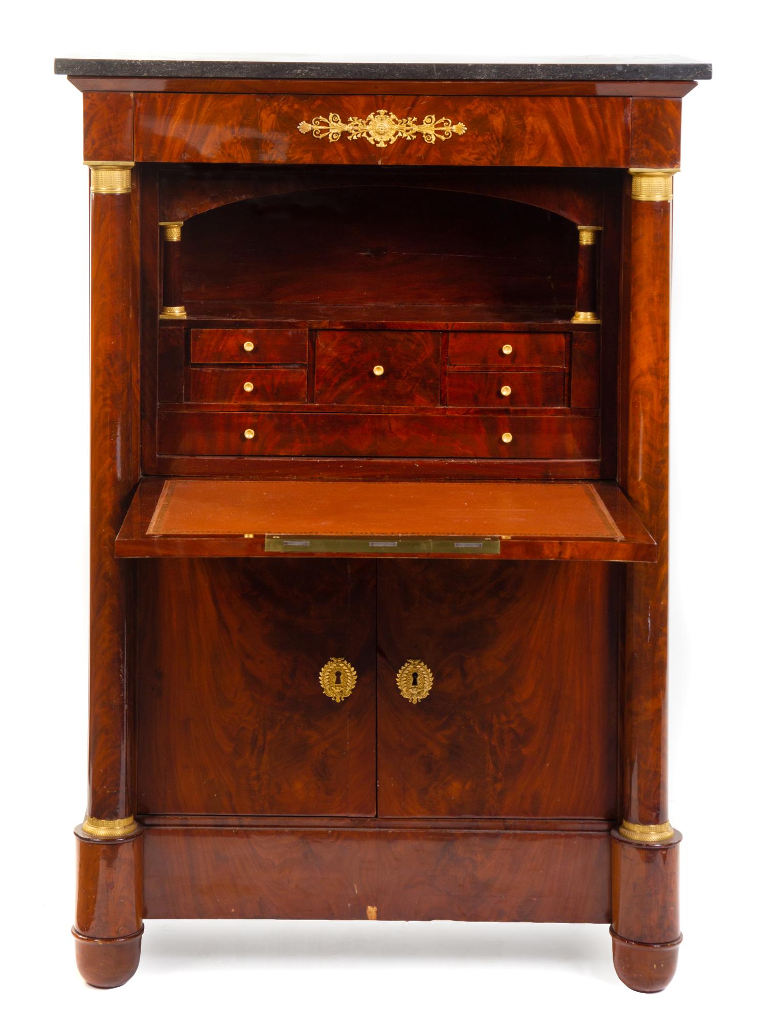 An Empire Gilt Bronze Mounted Mahogany Secretaire a Abattant Height 55 1/2 x width 38 1/2 x depth 17 5/8 inches. — EARLY 19TH CENTURY