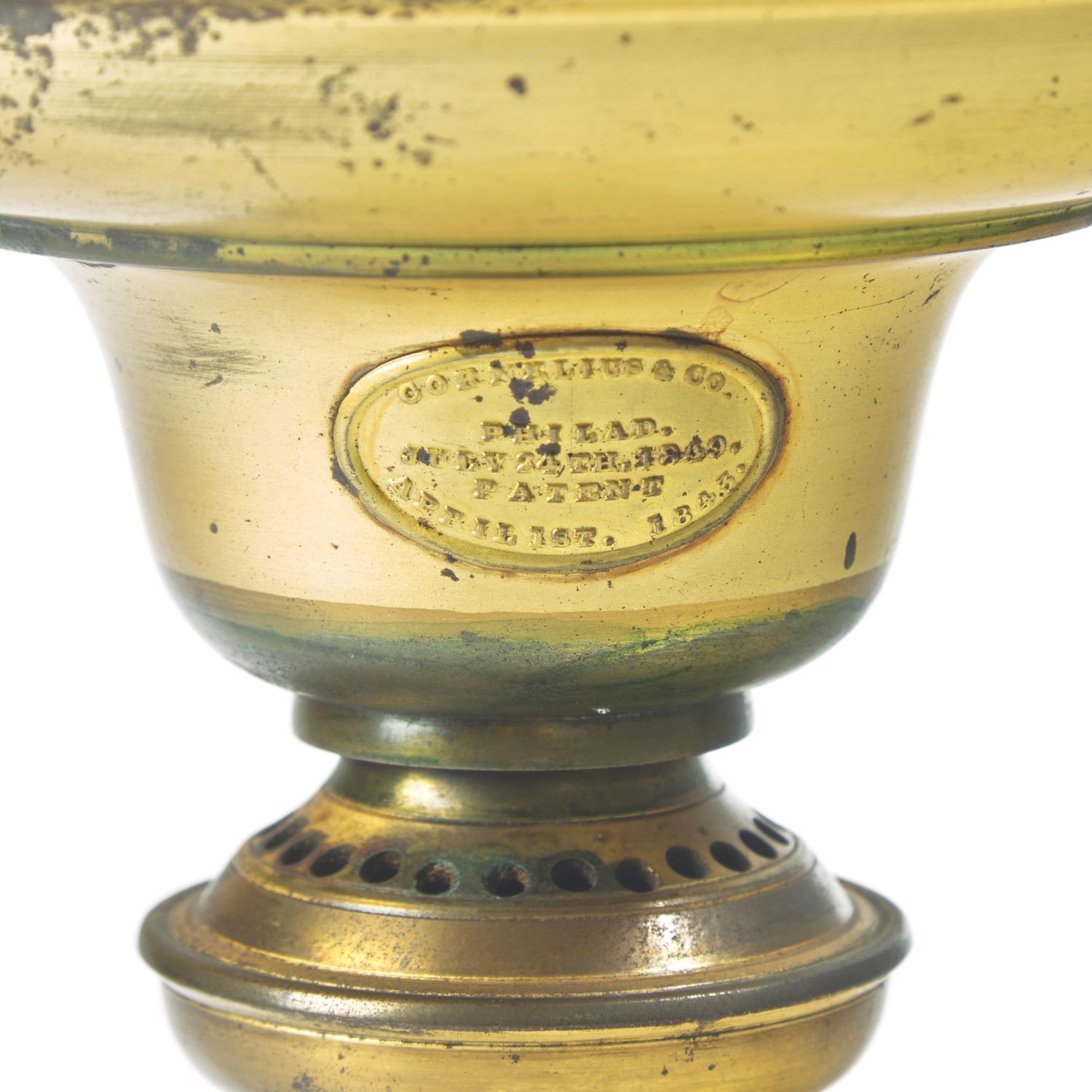 A Brass and Etched Glass Solar Lamp