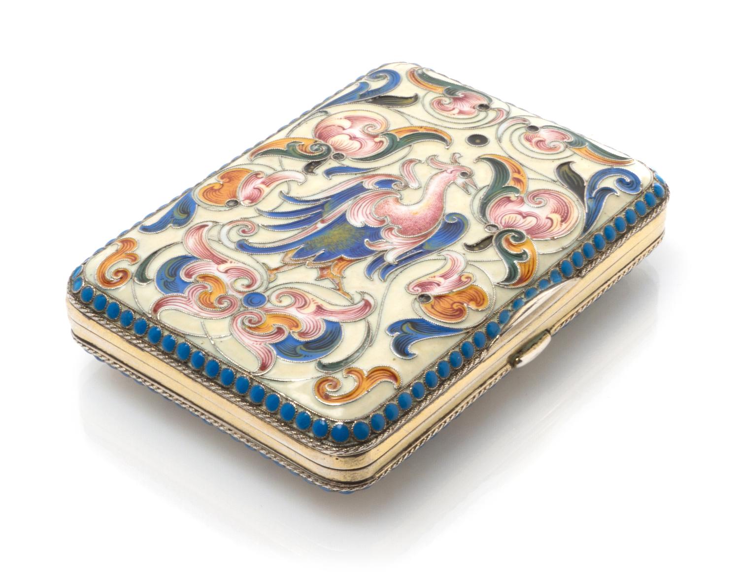 A Russian Enameled Silver Cigarette Case, Maker's and kokoshnik marks obscured, of rectangular form, the case with an enameled beige gr