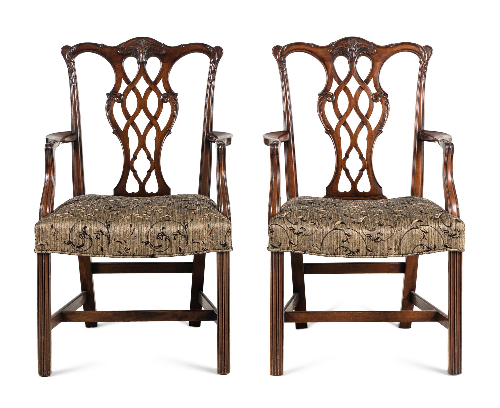 A Pair of George III Style Carved Mahogany Armchairs