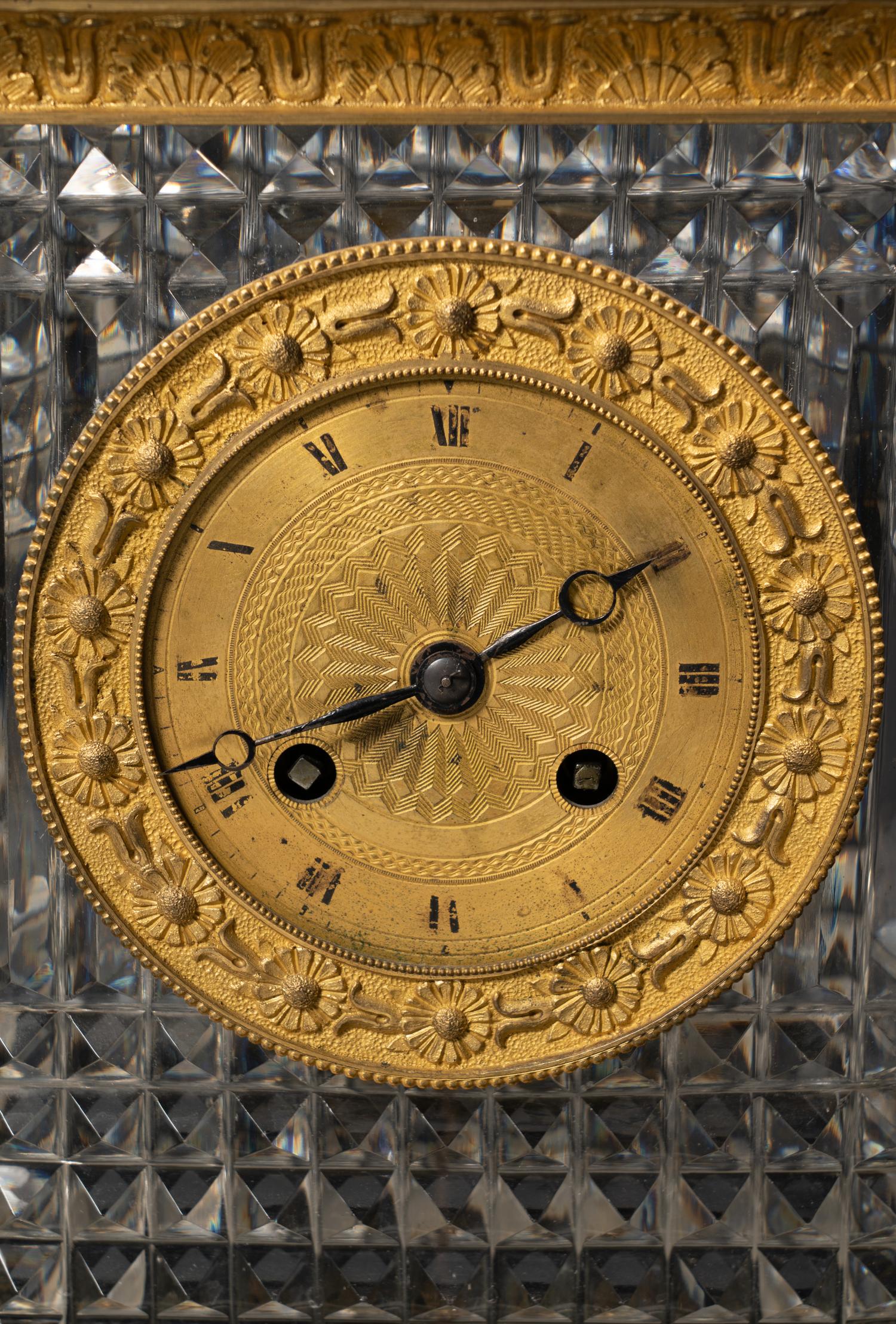 A Charles X Gilt Bronze and Cut Glass Mantel Clock