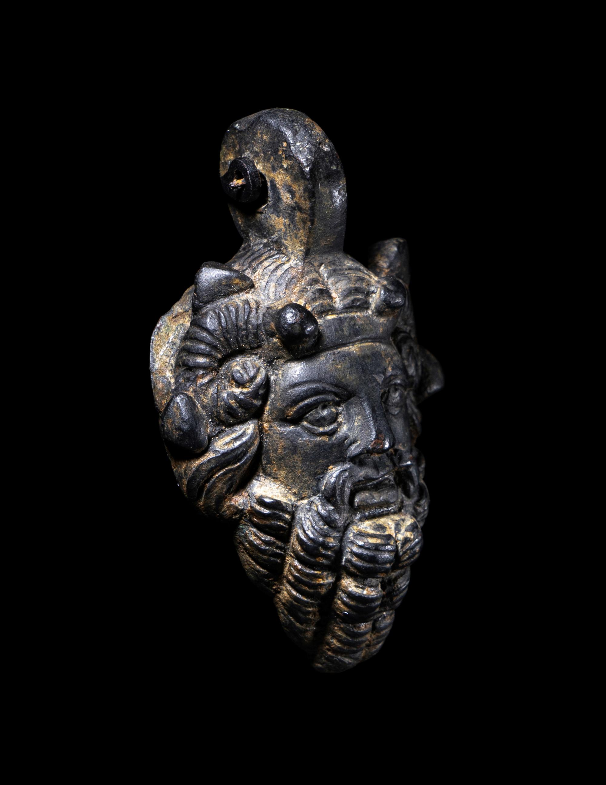 A Roman Bronze Zeus-Ammon Applique