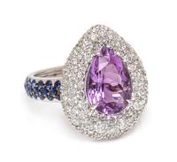An 18 Karat White Gold, Amethyst, Diamond and Sapphire Ring, 7.40 dwts.