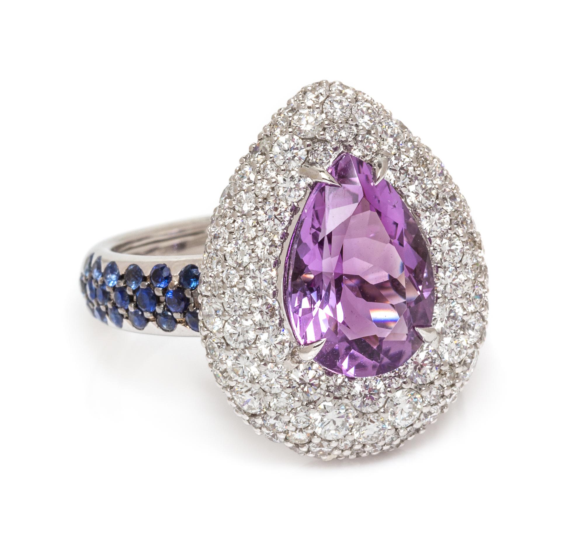 An 18 Karat White Gold, Amethyst, Diamond and Sapphire Ring, 7.40 dwts.
