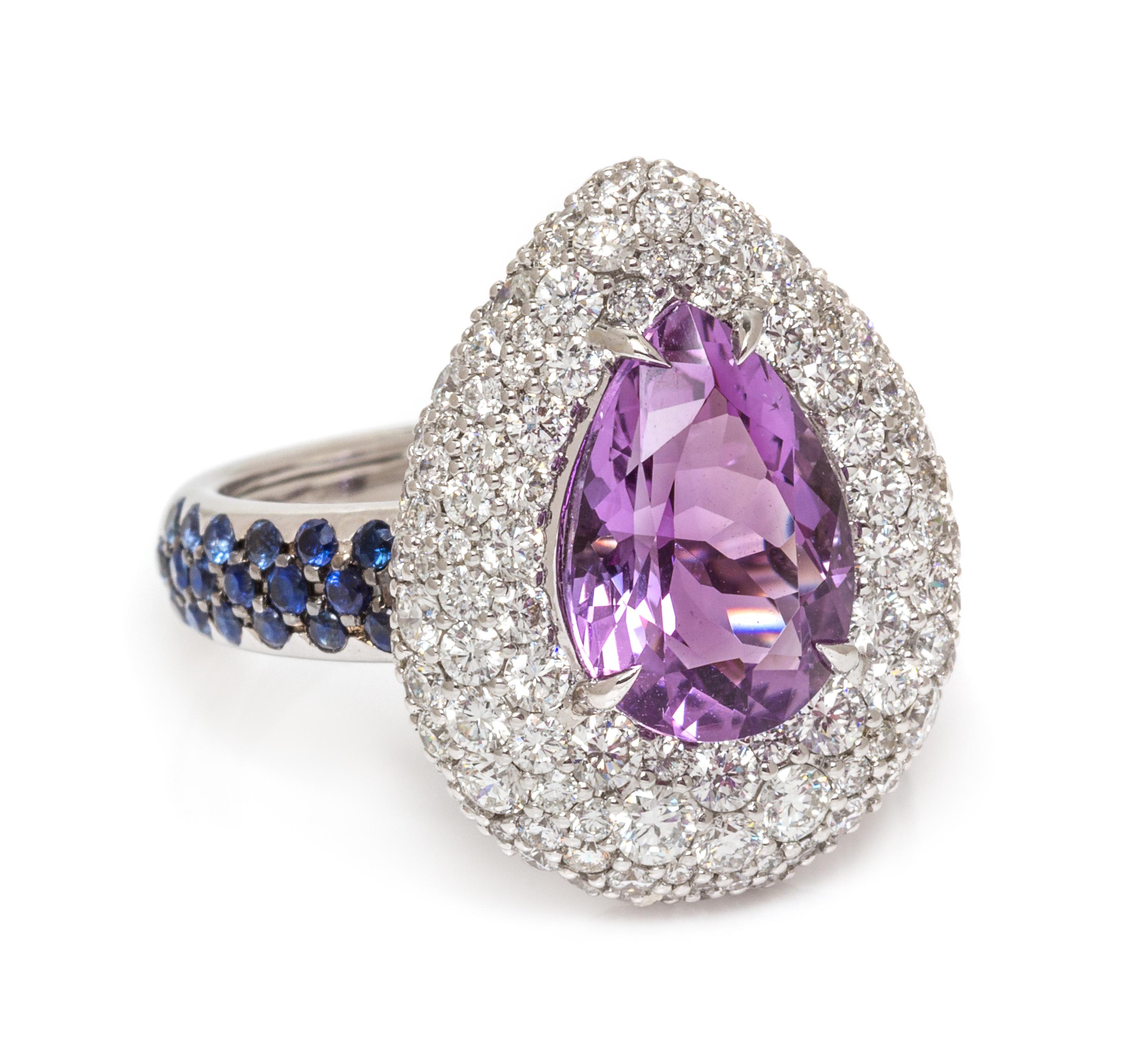 An 18 Karat White Gold, Amethyst, Diamond and Sapphire Ring, 7.40 dwts.