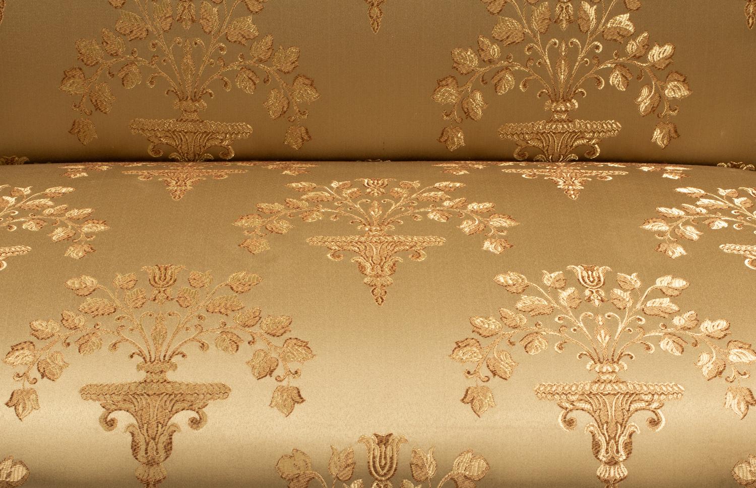 A Pair of Louis XV Style Painted and Parcel Gilt Settees