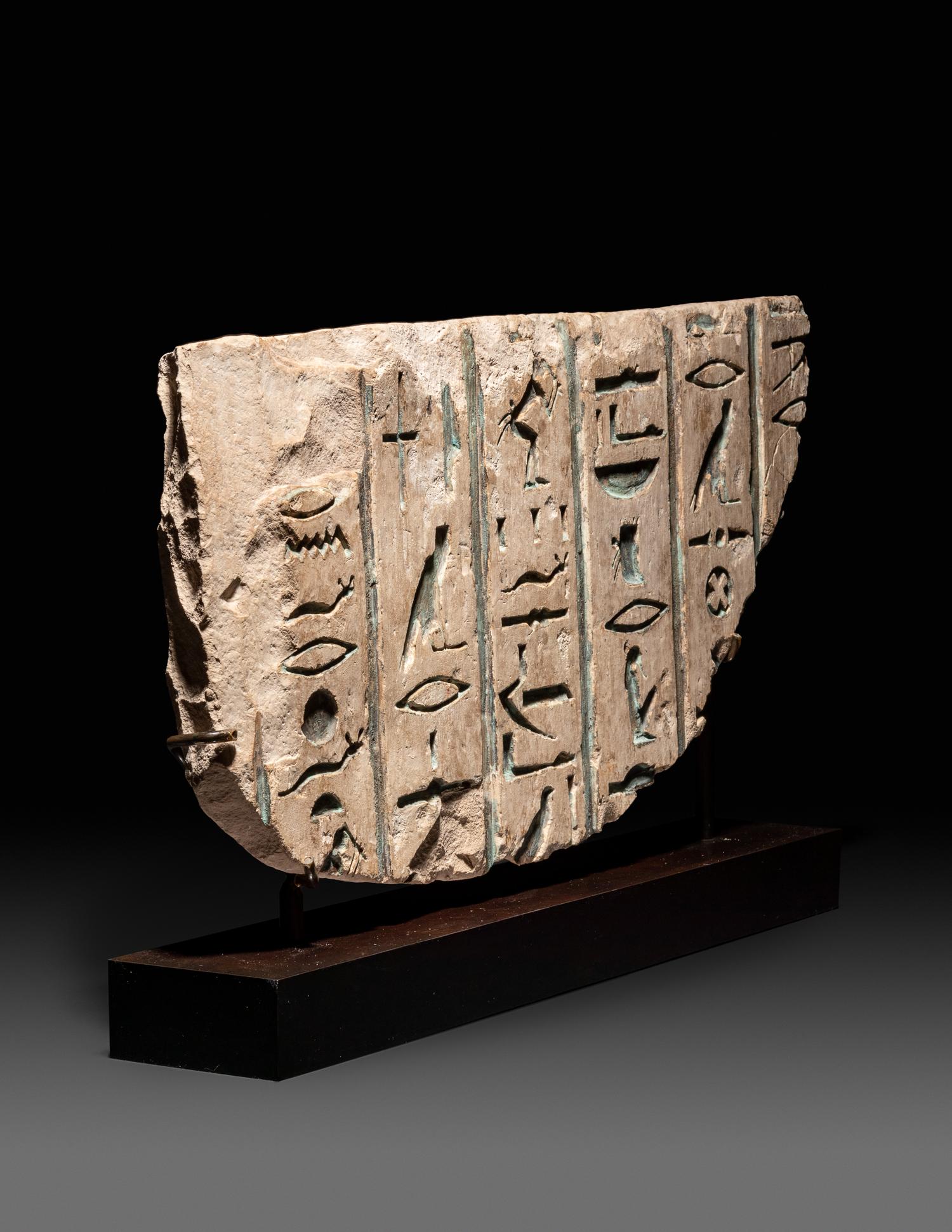 An Egyptian Limestone Relief with an Inscription