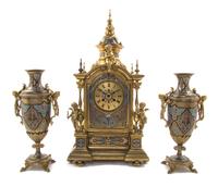 A Continental Gilt Bronze and Champleve Clock Garniture, 19TH/20TH CENTURY, MOVEMENT BY JAPY FRERES, Height of clock 21 inches. — 19TH/20TH CENTURY, MOVEMENT BY JAPY FRERES,