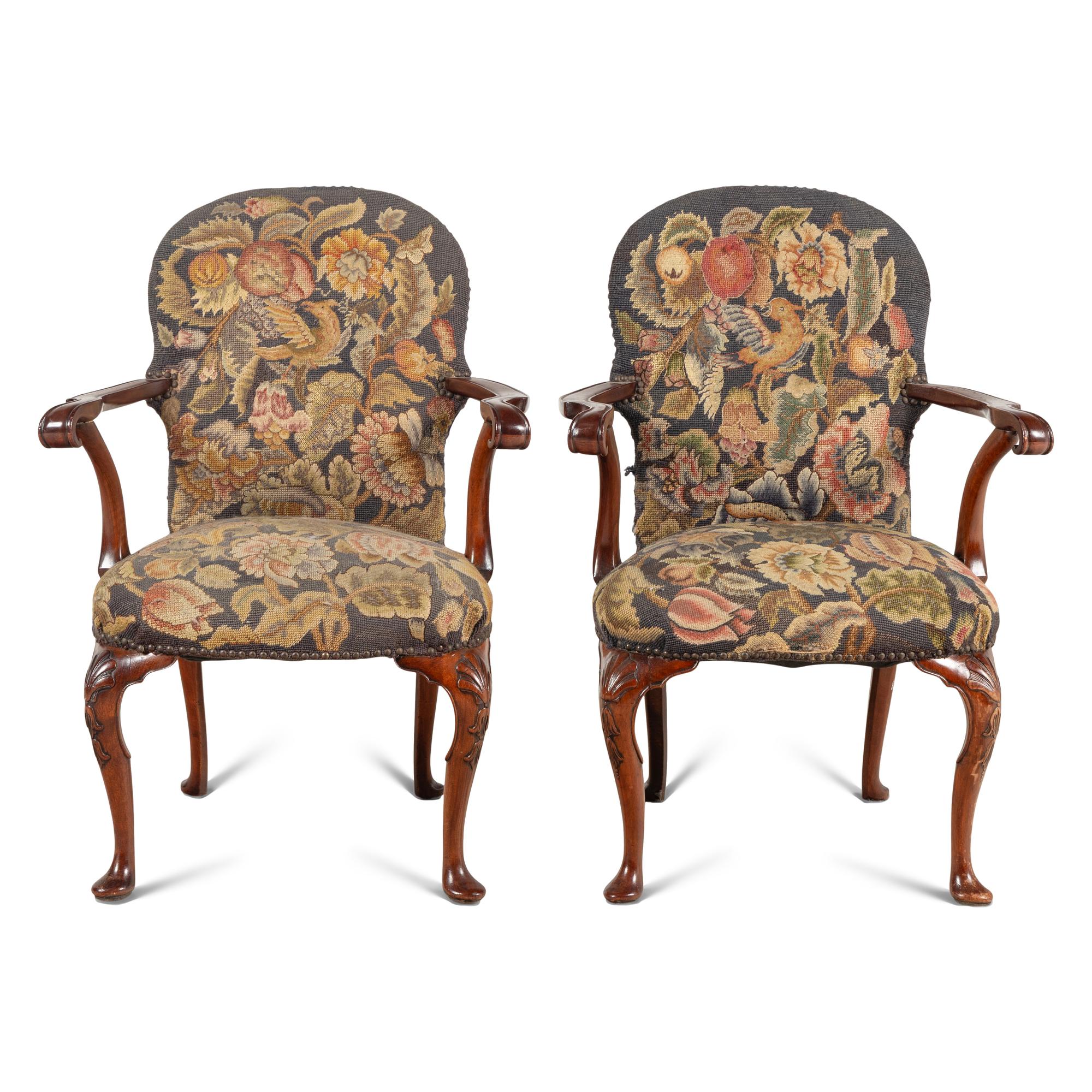 A Pair of George I Style Carved Mahogany and Needlework Upholstered Armchairs