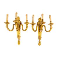A Pair of Louis XVI Gilt Bronze Three-Light Sconces