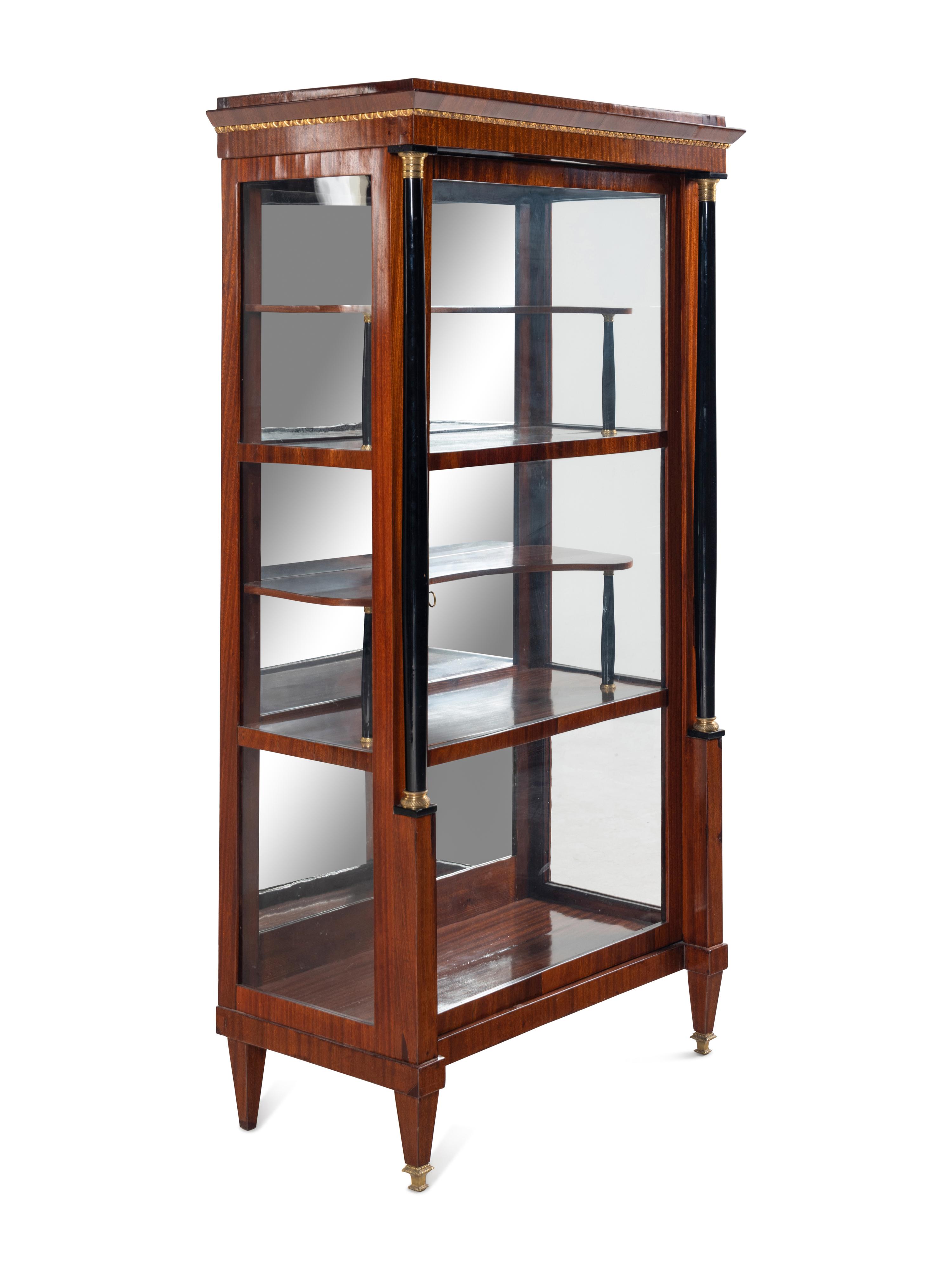 An Austrian Neoclassical Gilt Metal Mounted and Part-Ebonized Mahogany Vitrine