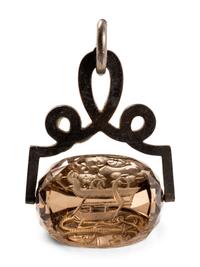A German Carved Topaz and Gilt Metal Mounted Hand Seal